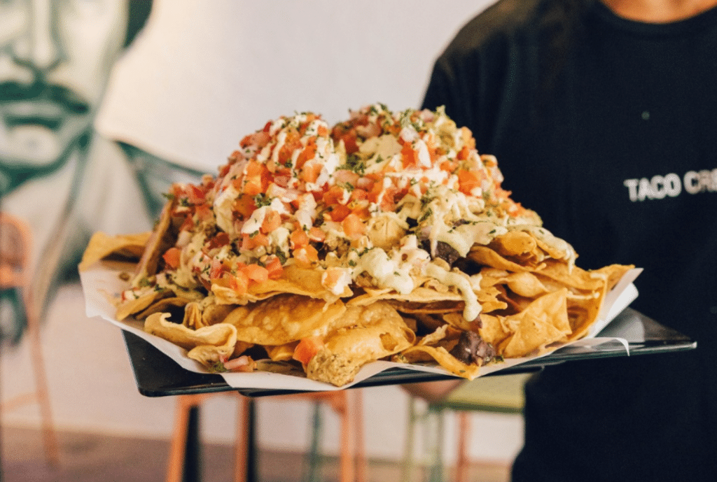 a photo of a giant plate of nachos
