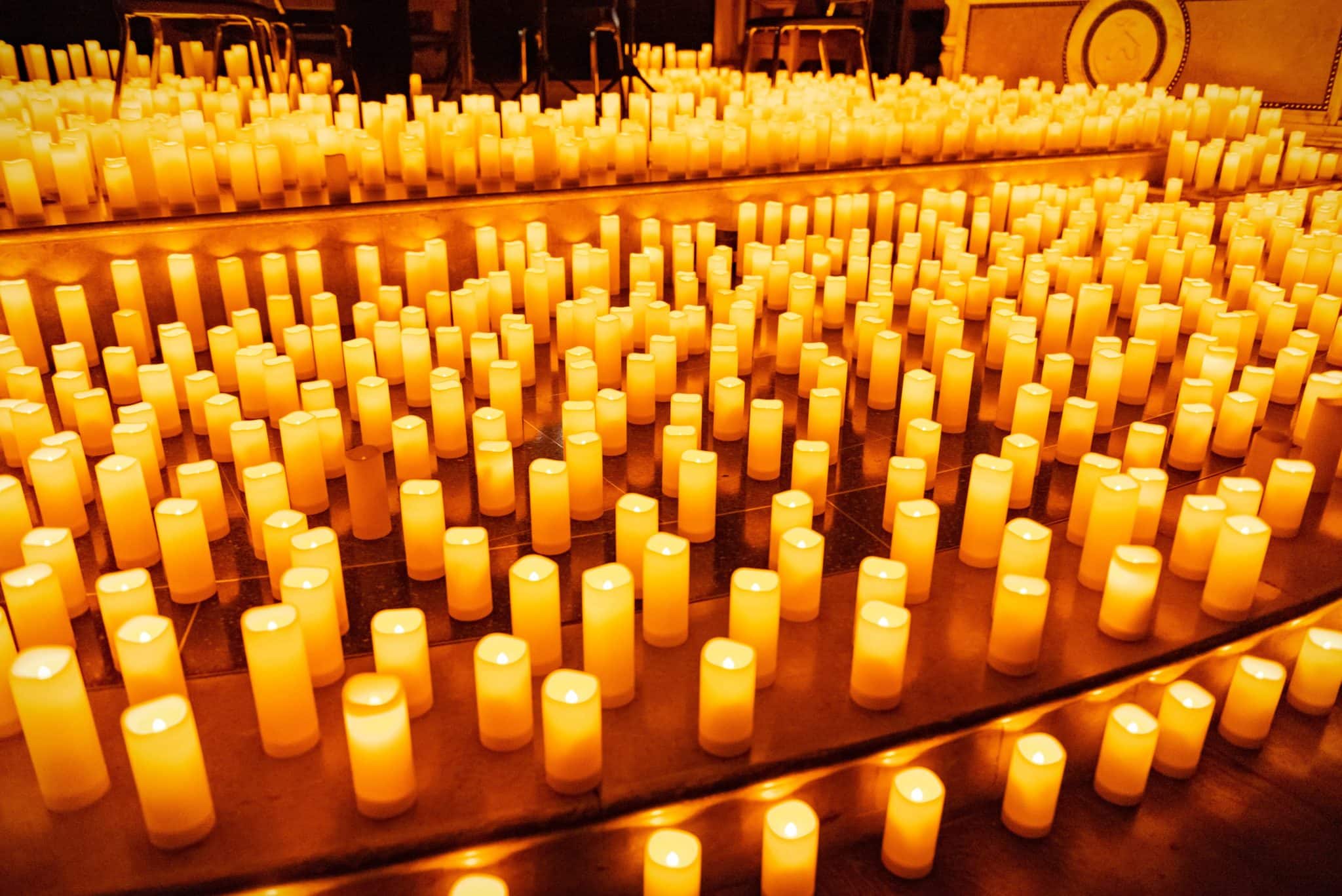 hundreds of candles on stage at a Candlelight concert.