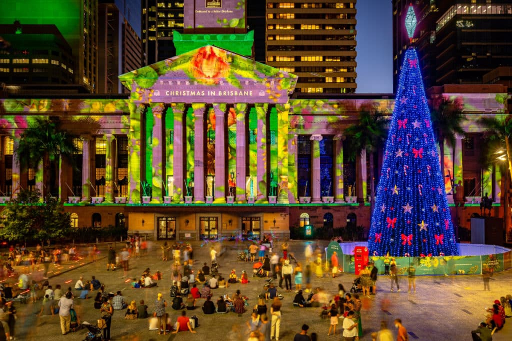 a photo of city hall lit up with christmas lights in brisbane
