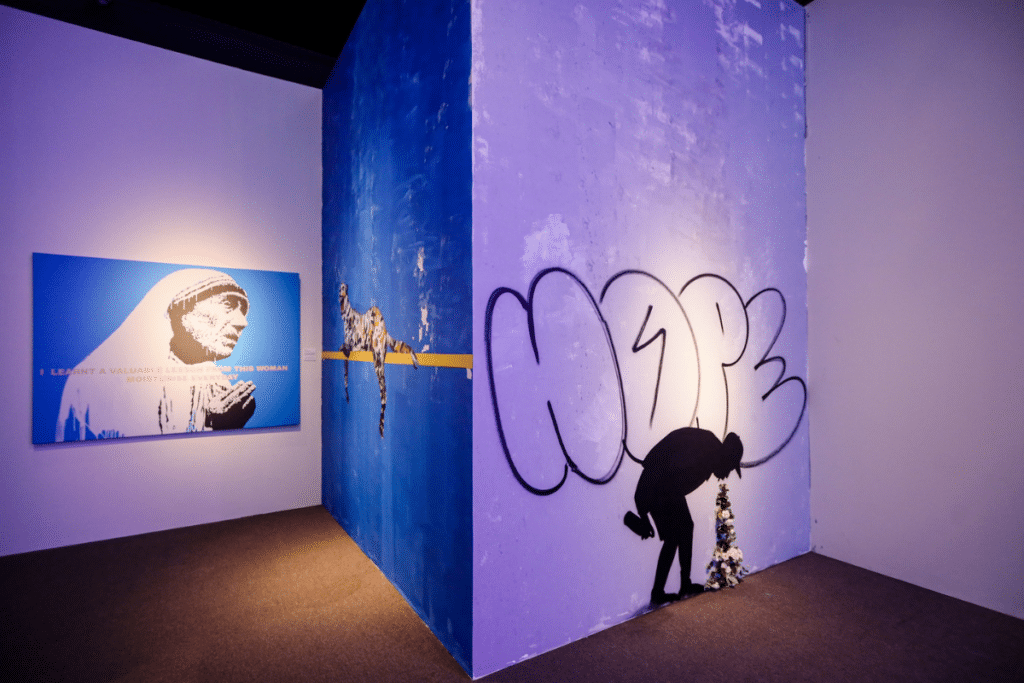 Some of the art displayed in The Art of Banksy: “Without Limits”