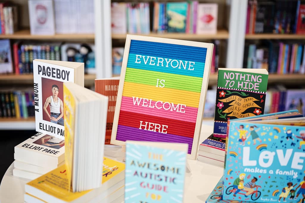 a photo of a book table at a bookshop